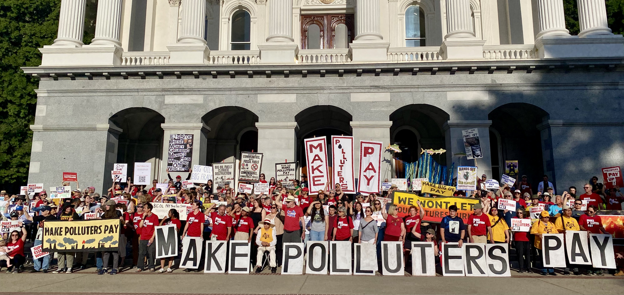 Make Polluters Pay protestors gathered together
