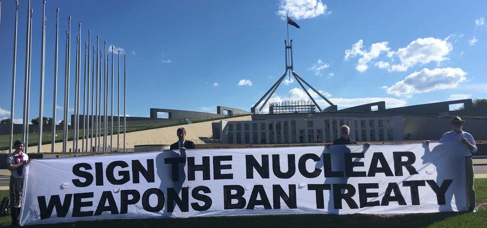 Sign_the_treaty_banner_-_parl_nov_2017_cropped
