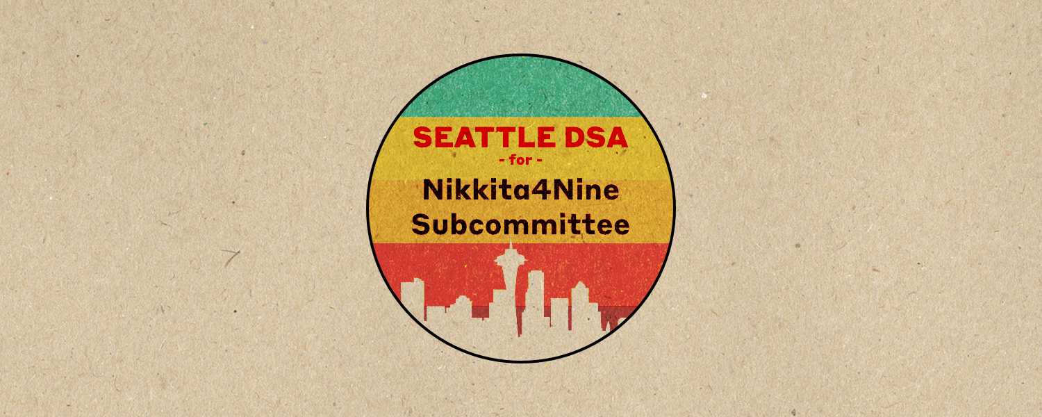 AltText: Alt Text: Text in red and black "Seattle DSA -for- Nikkita4Nine. Subcommittee" on a circular rainbow gradient on a craft paper background