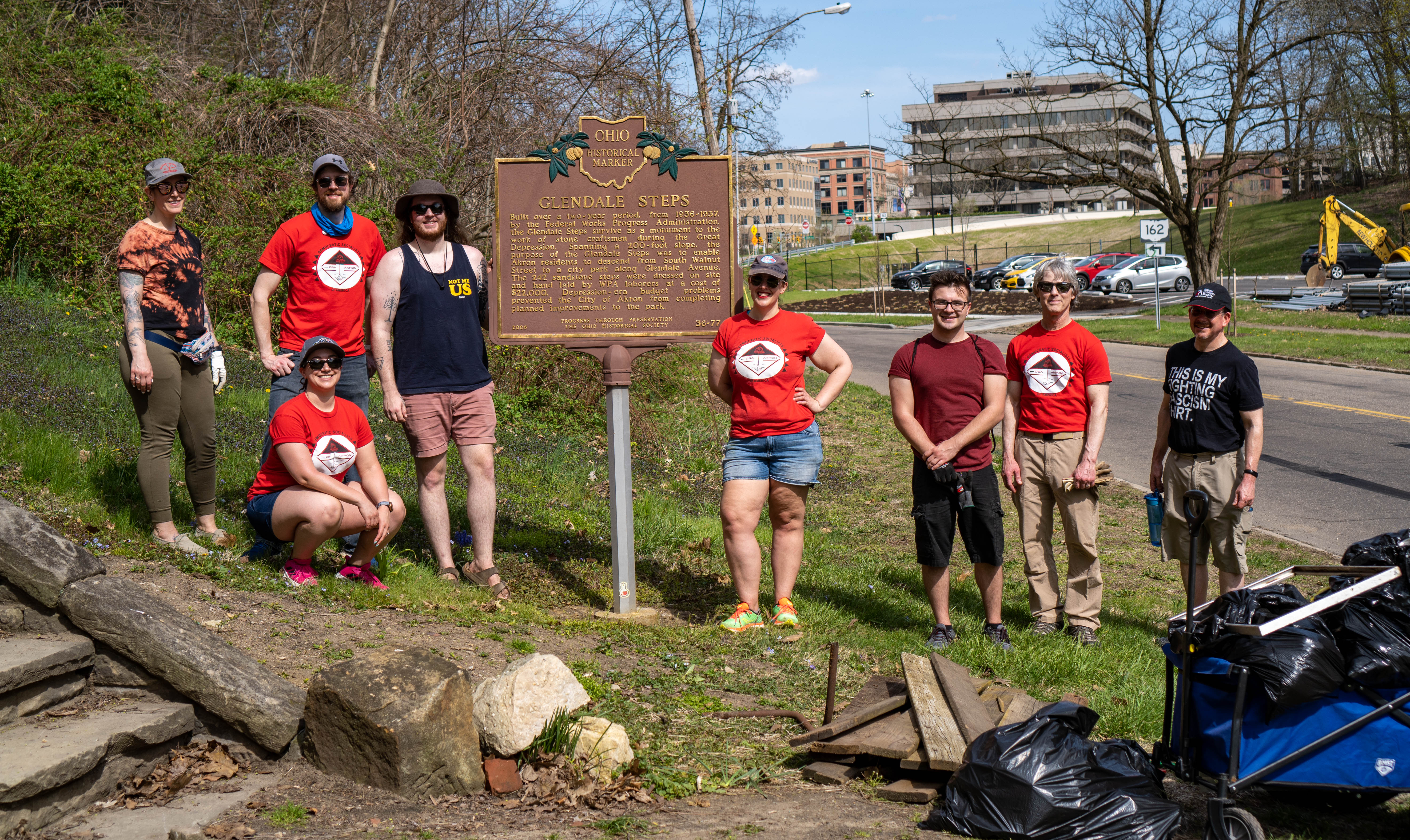 Cleanup crew around the Glendale Steps sign