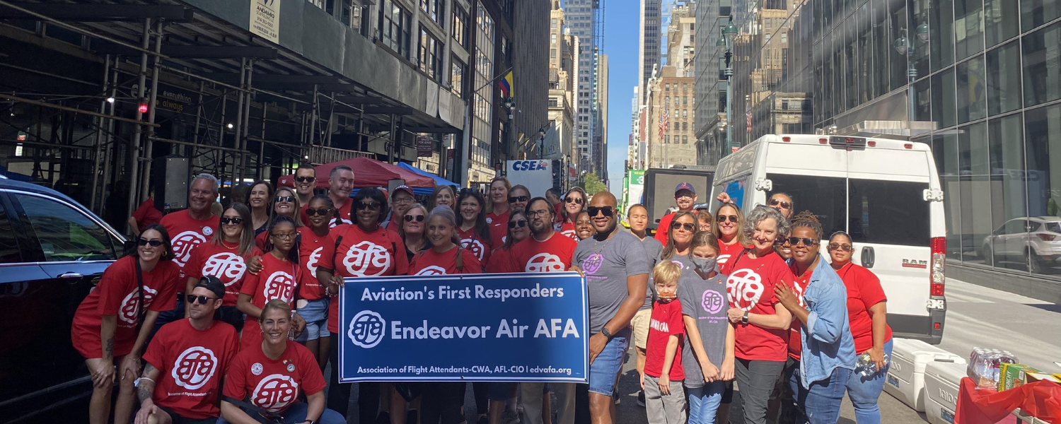 Association of Flight Attendants Members pose for a photo at the 2022 Labor Day Parade