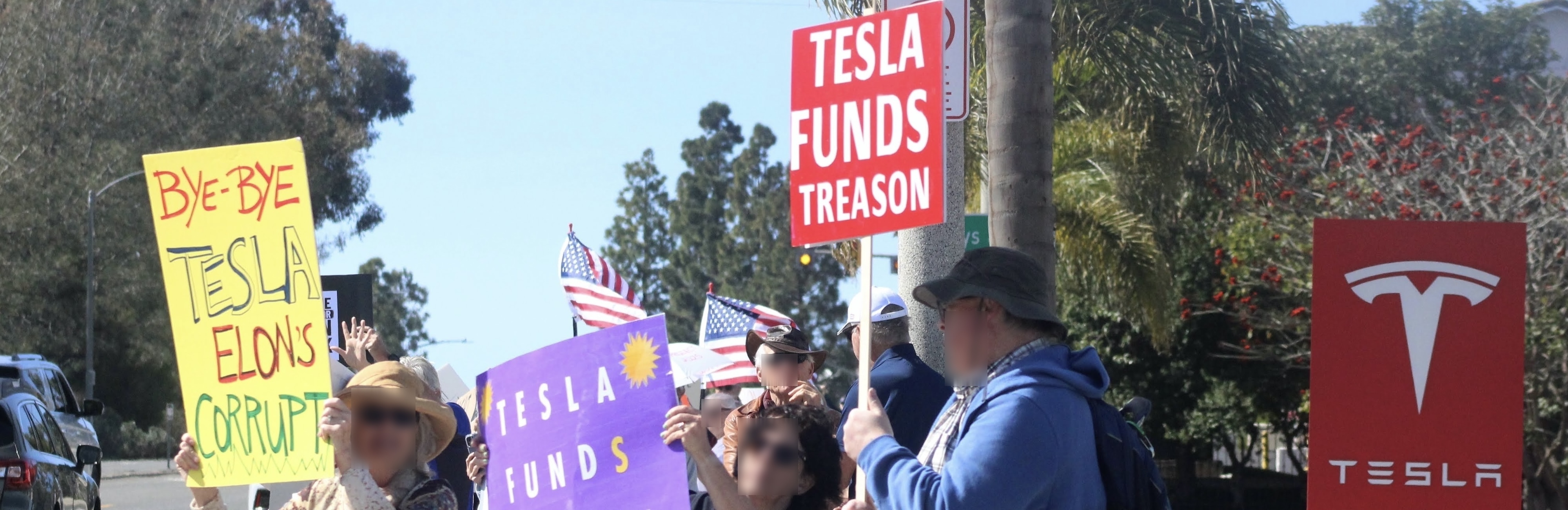Protestors outside Encinitas, CA Tesla location