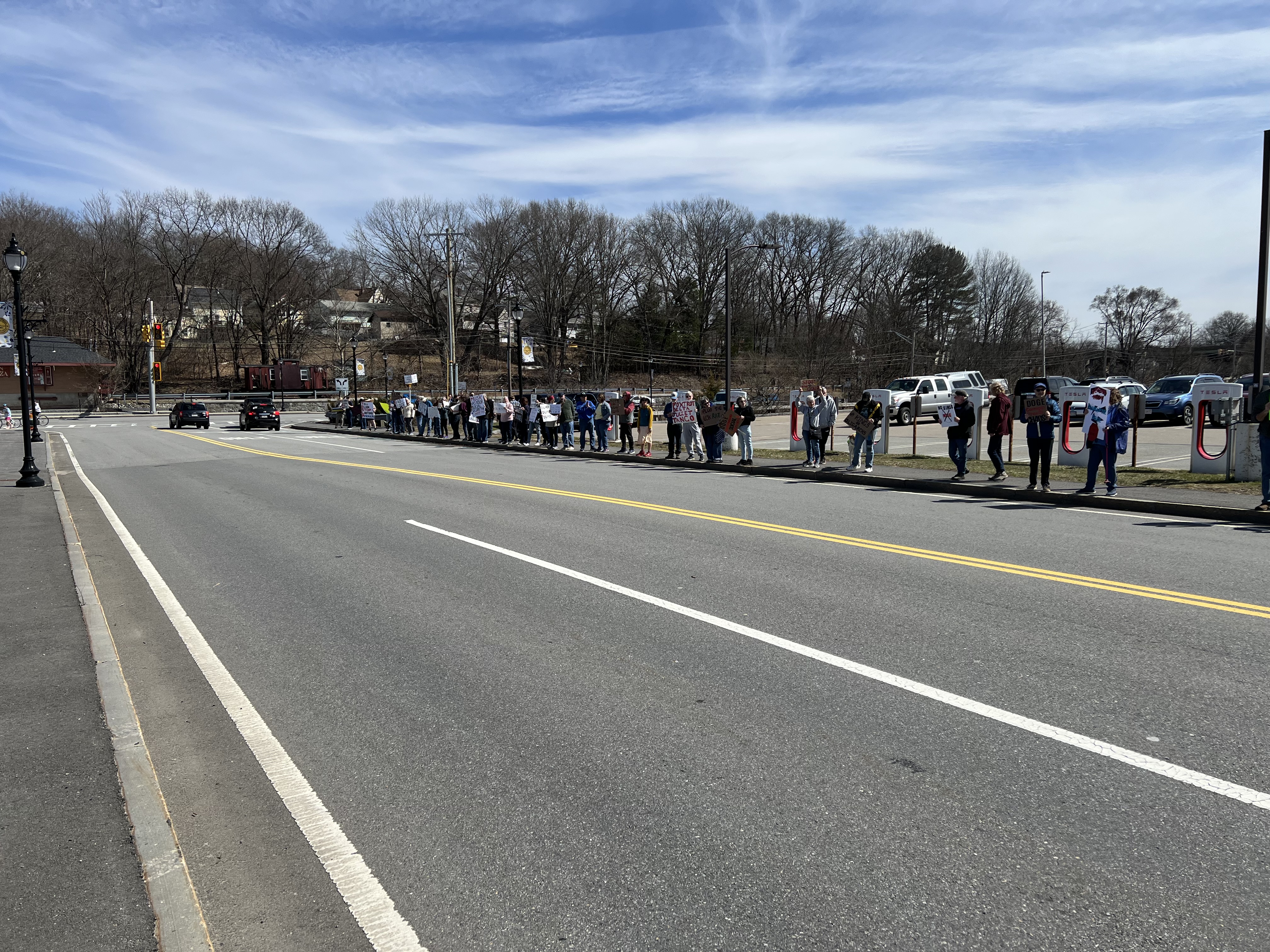 #TeslaTakedown protesters at Auburn Mall Tesla Supercharger site