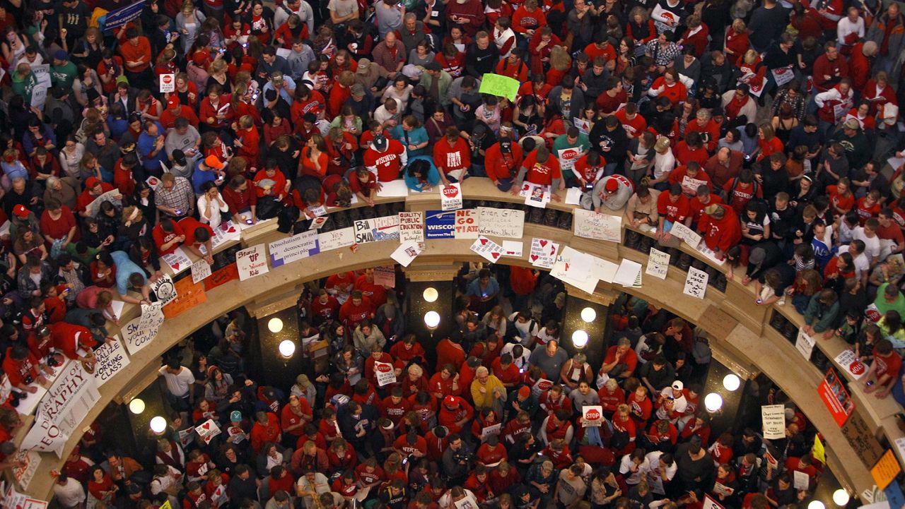 Image of protestors at the Madison Wisconsin State House in 2011