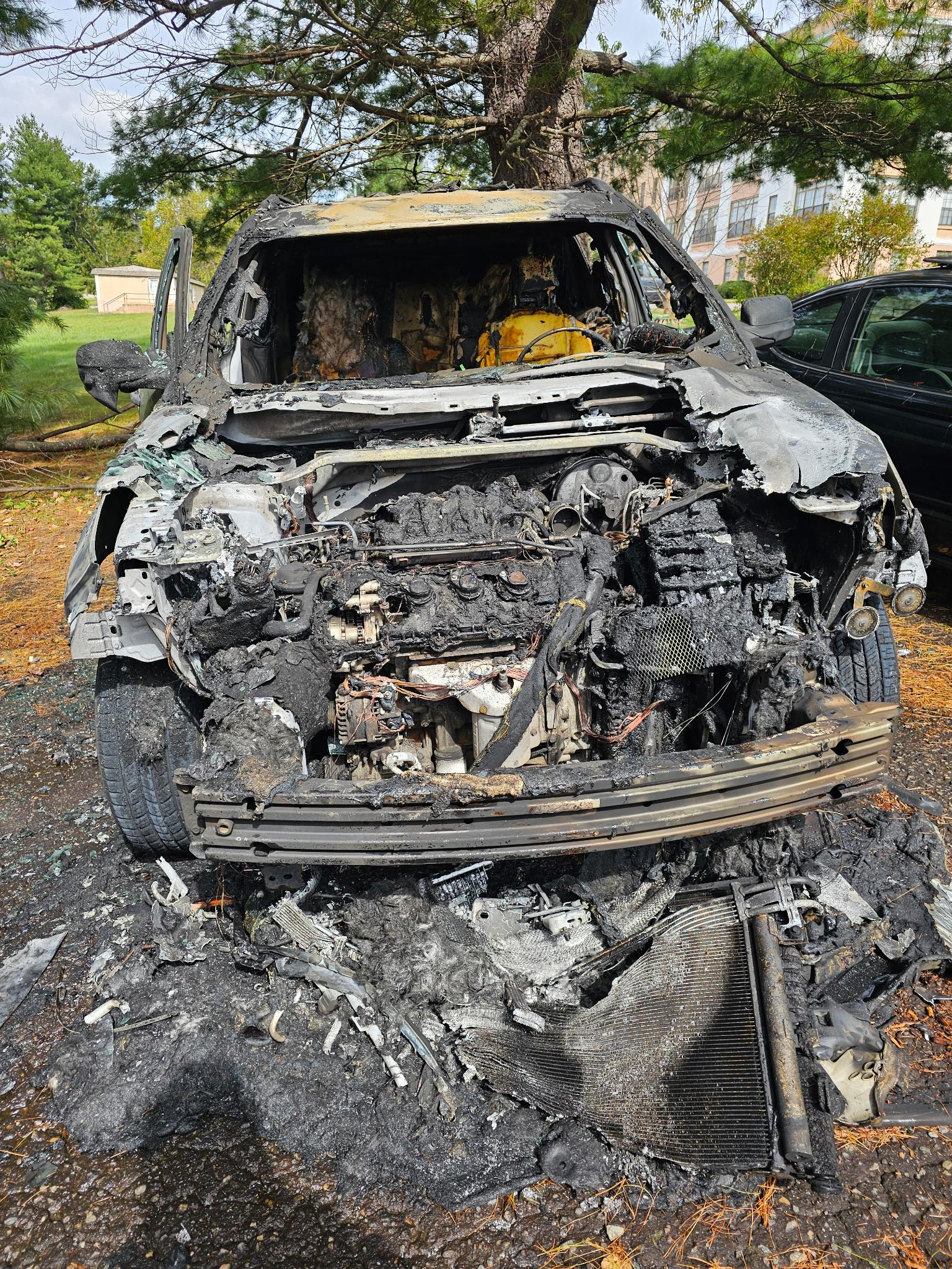 Wreck of a burned out car