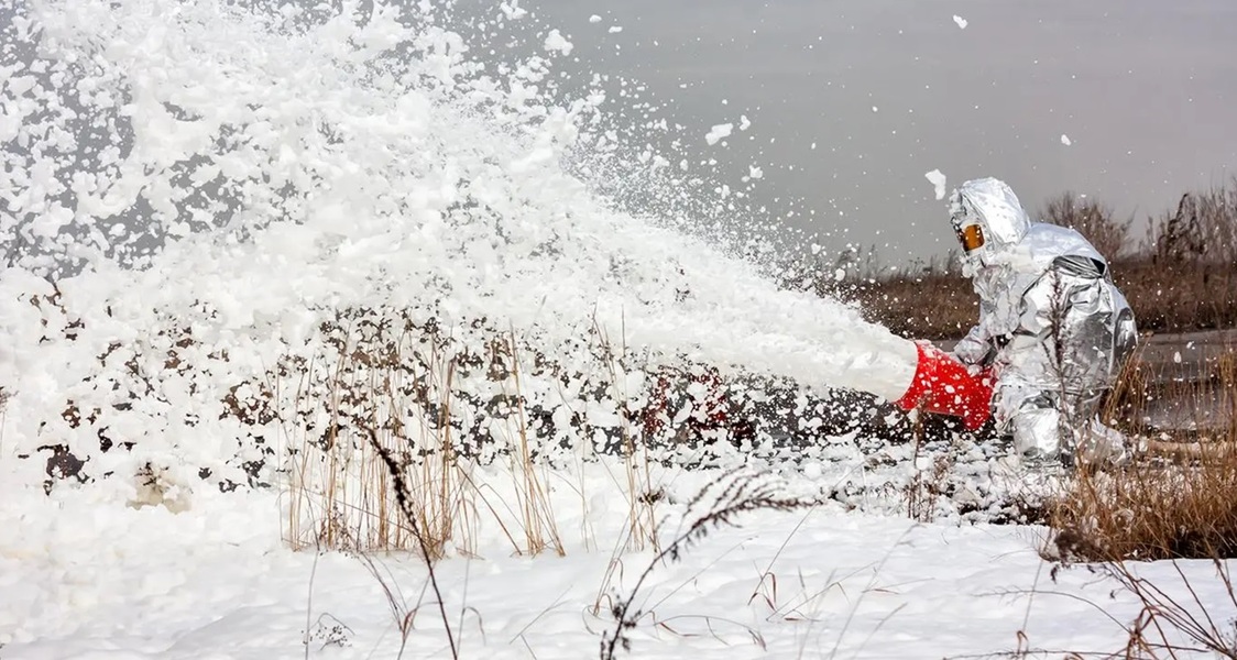 Firefighting foam sprayed on a prairie. In Dane County, PFAS has contaminated our soil, our drinking water, our lakes, and our streams