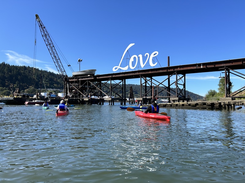 Blue sky, kayaks in water
