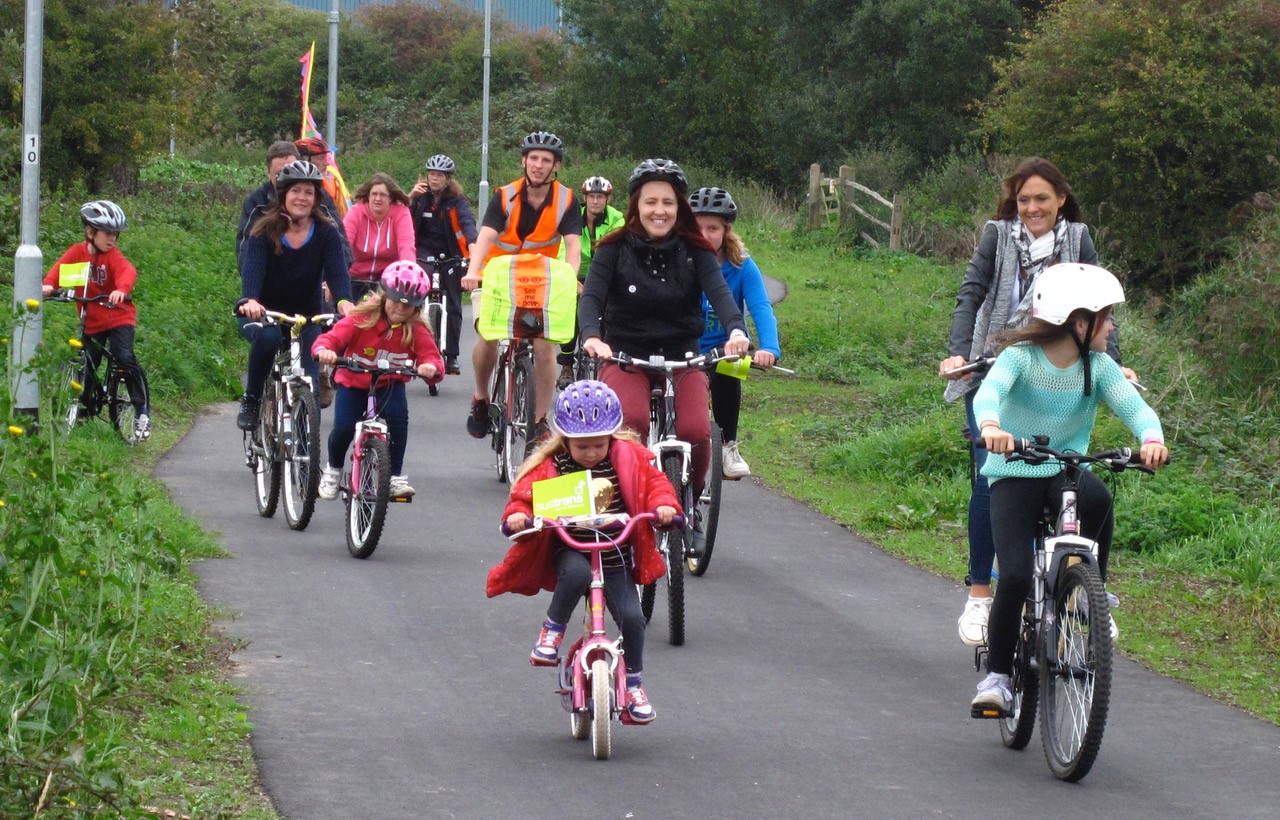 Families cycling along a traffic free route