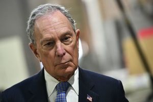 Mike_Bloomberg_looks_on_while_visiting_Building_Momentum_a_veteran_owned_business_in_Alexandria__Virginia_on_February_7_2020._(Photo_by_MANDEL_NGAN_AFP_via_Getty_Images)