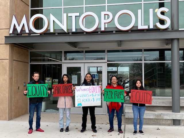 community activity standing in front of cap metro to demand they center equity