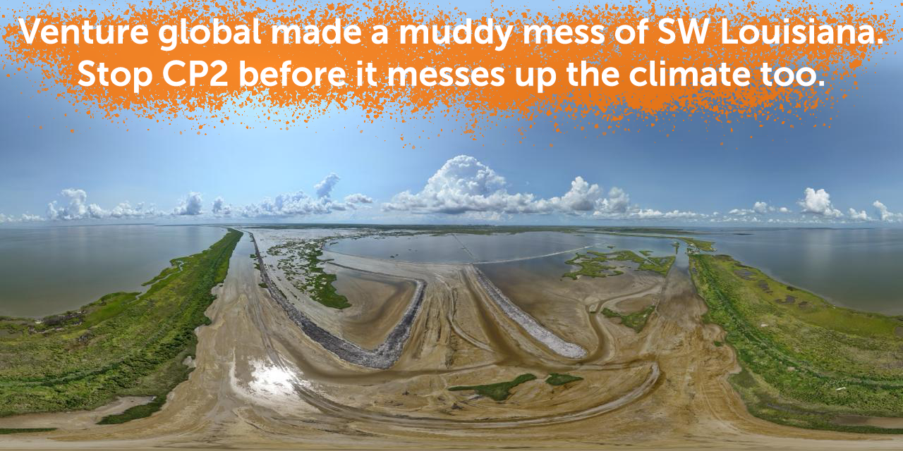 a panoramic shot shows dredging mud spilling into a waterway in SW Louisiana under a bright blue sky 