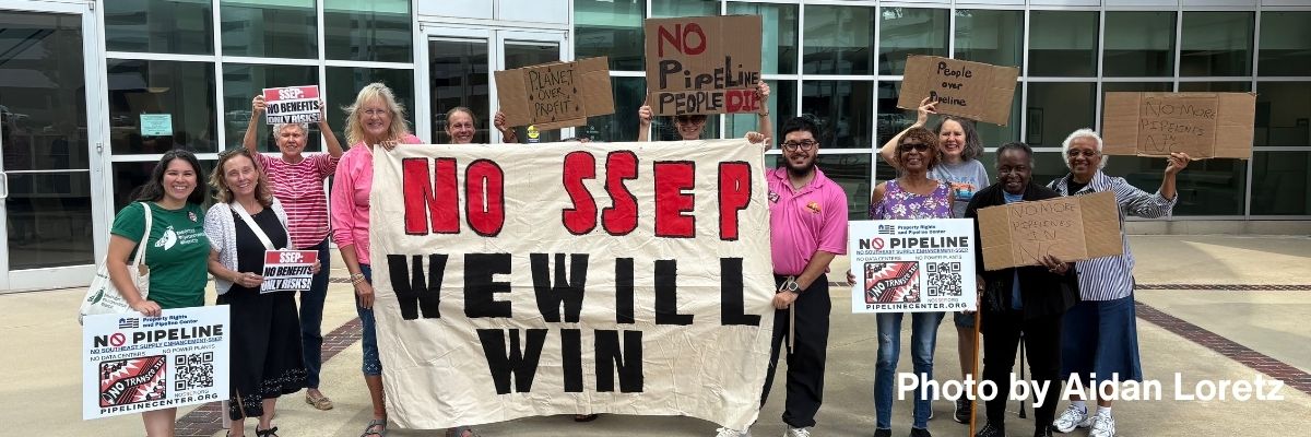 Protesters holding banner saying "No SSEP"