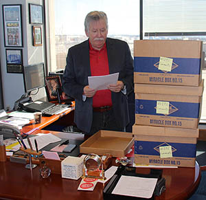 CWA President Chris Shelton with the thousands of CWA member comments to the U.S. International Trade Commission.