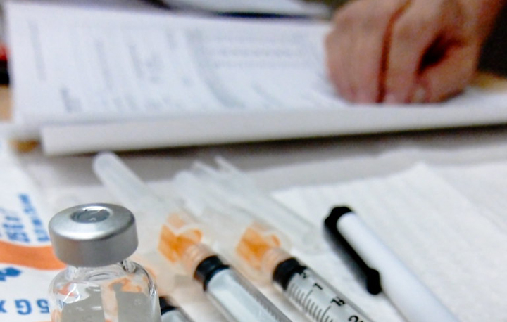 Vaccine vial and syringes Vaccine vial and syringes