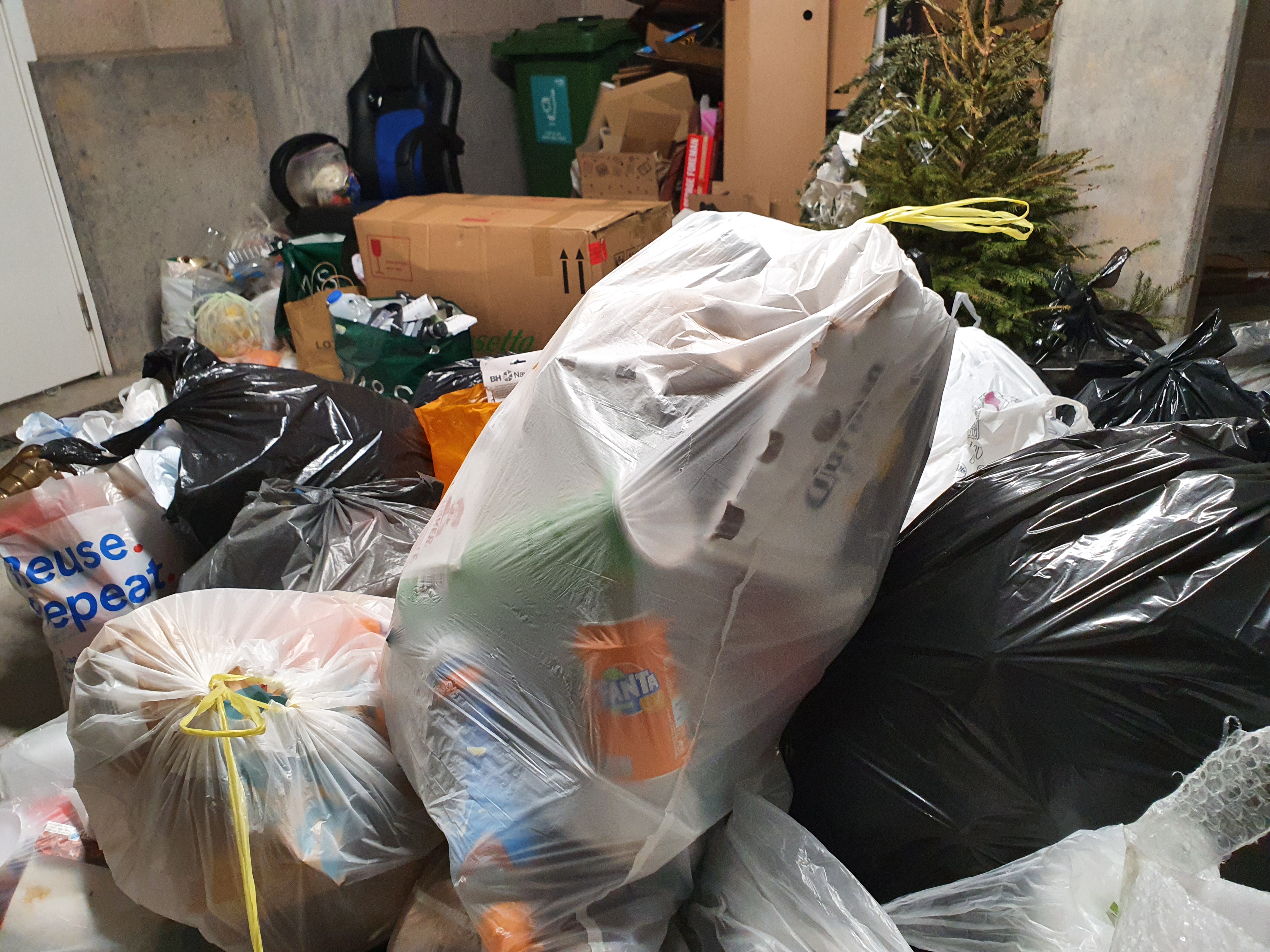 Overflowing bin in flats in Harbouside