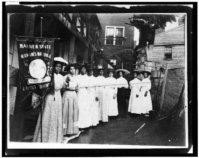 Black suffragists posing for a photo in the early 20th century