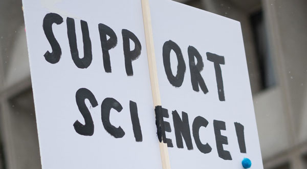 Protest sign that reads "Support Science"