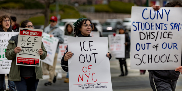 Protesters, front sign reads "ICE out of NYC"