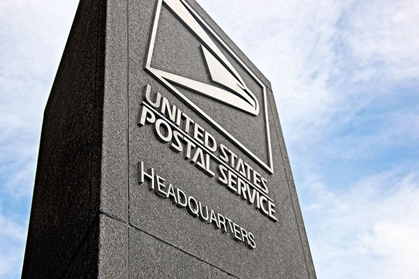 United States Postal Service sign - Image Credit: By Tim1965 - Own work, CC BY-SA 3.0, https://commons.wikimedia.org/w/index.php?curid=13688018 United States Postal Service sign - Image Credit: By Tim1965 - Own work, CC BY-SA 3.0, https://commons.wikimedia.org/w/index.php?curid=13688018