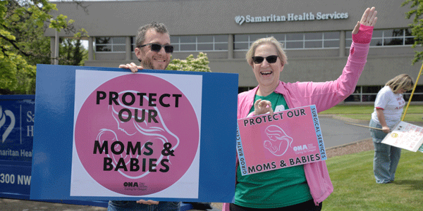 ONA members with signs ONA members with signs