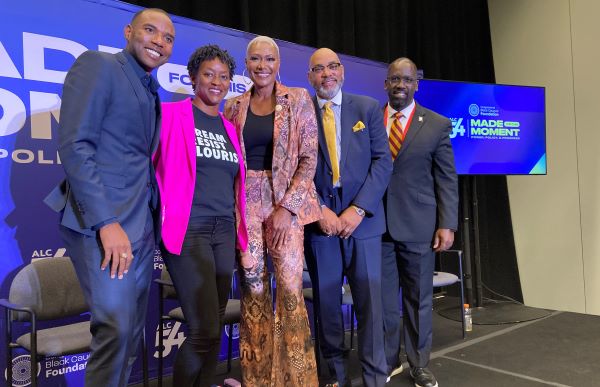 Panelists posing and smiling for a photo at the CBCF-ALC