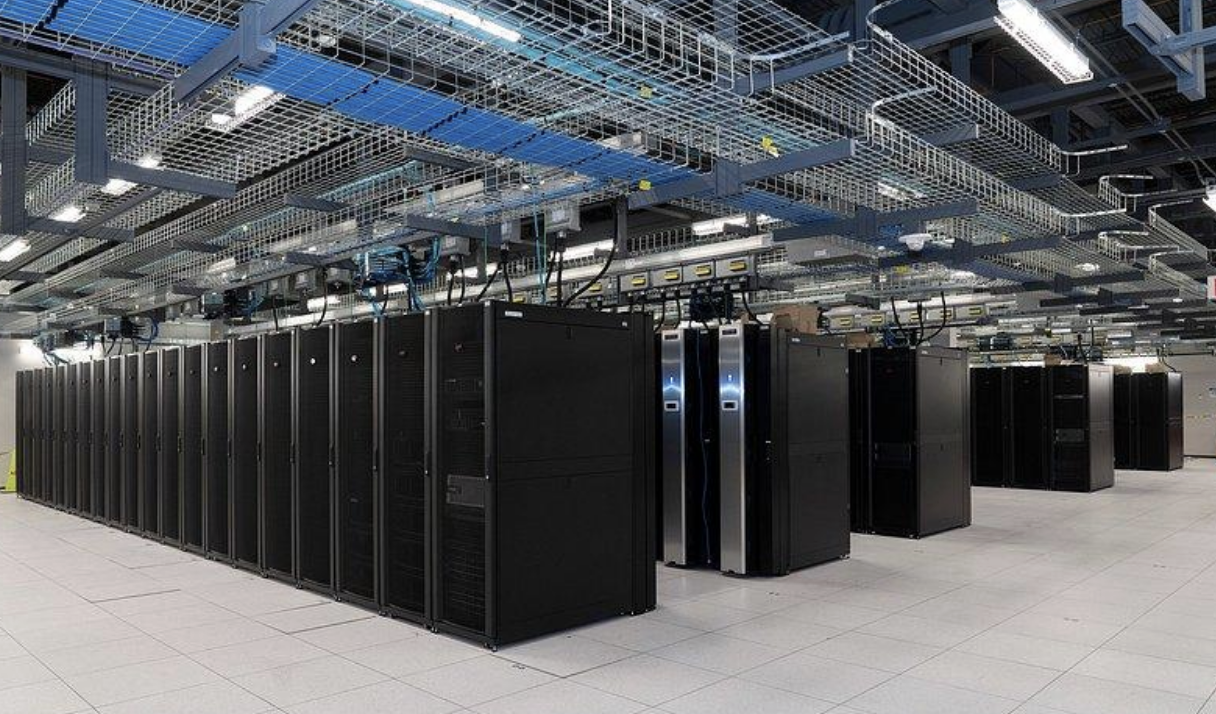 Interior of data center with rows of server racks