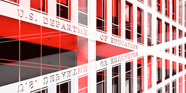 Photo of the Dept. of Education, with another photo turned upside and superimposed across it