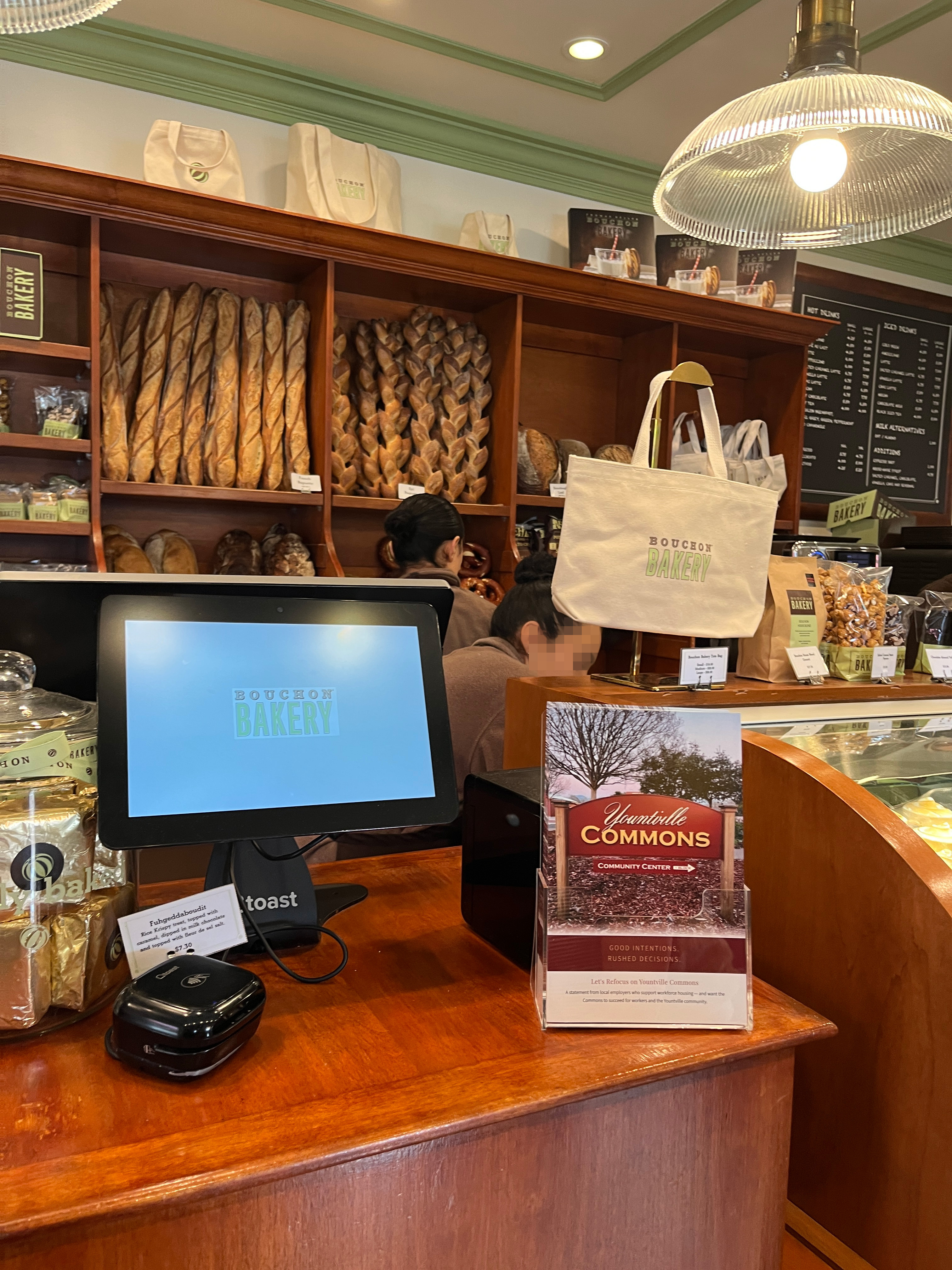 Photo glossy brochures opposing the 100% Affordable Housing development down the road from Bouchon Bakery