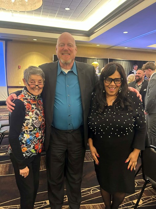 Senator Hardman poses for a picture with Loretta Sieman and Dr. Matt Adams at the Clive Chamber Dinner.