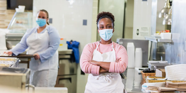 Two school cafeteria workers. | Our support staff deserve better!