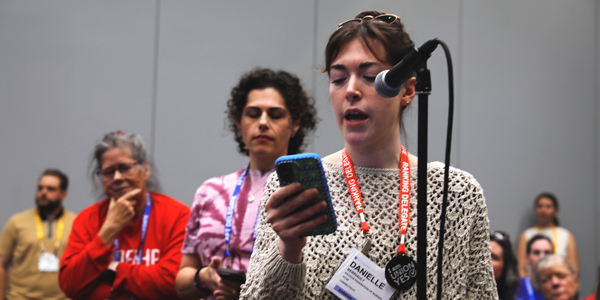 Woman at a microphone Woman at a microphone