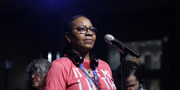 Woman at a microphone Woman at a microphone