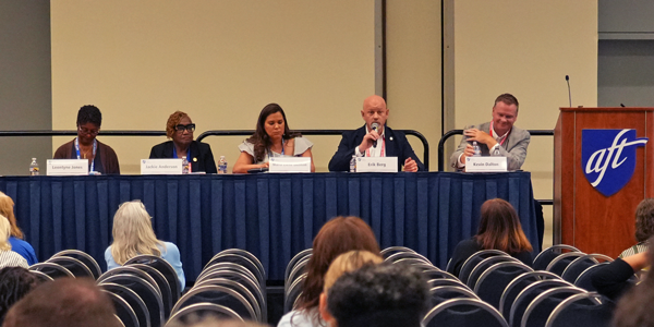 Panelists speak at the AFT Teachers divisional meeting. 