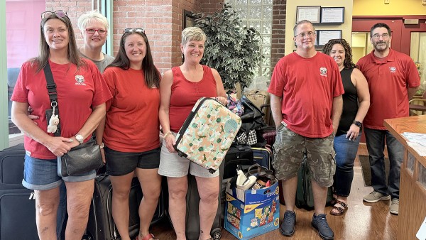 CWA D2-13 Collects Luggage to Help Kids