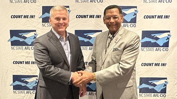 CWA President Cummings with N.C. Governor Josh Stein at AFL-CIO Meeting